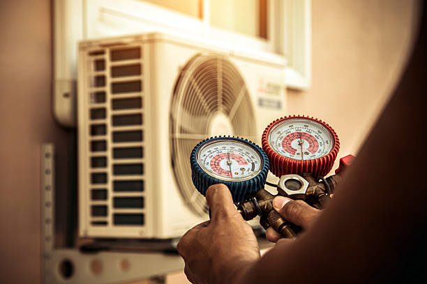 Professional Heat Pump Repair technician working in East Norwich, NY